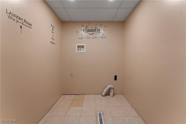 4010 11th Ave, Parkersburg, WV 26101 - washroom with tile patterned flooring and hookup for a washing machine