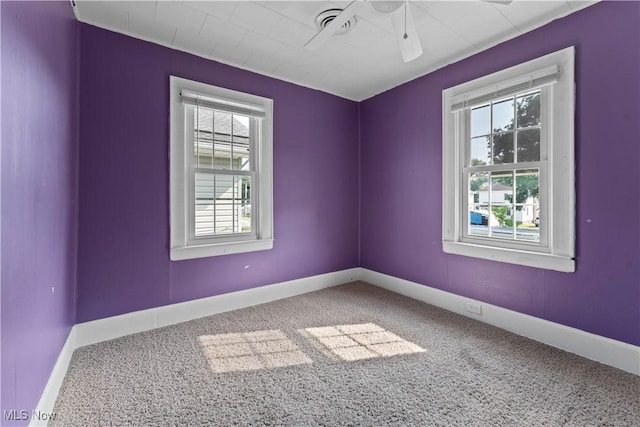 4010 11th Ave, Parkersburg, WV 26101 - carpeted empty room with healthy amount of natural light and a ceiling fan