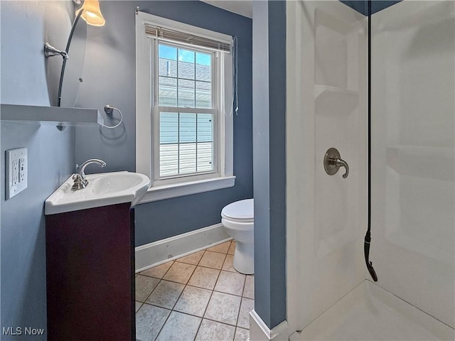 4010 11th Ave, Parkersburg, WV 26101 - full bath with a walk in shower, tile patterned flooring, and vanity