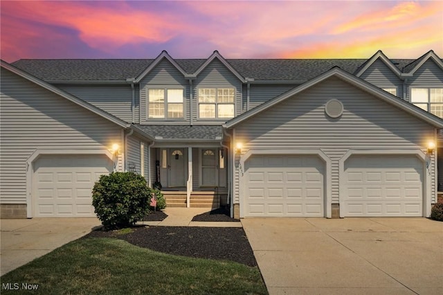 1653 Maple View Ct, Streetsboro, OH 44241 - traditional-style home featuring a garage, driveway, and a porch