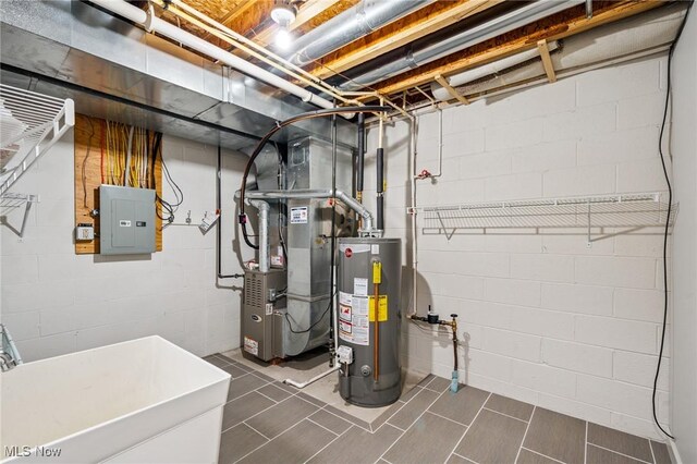 1653 Maple View Ct, Streetsboro, OH 44241 - unfinished below grade area featuring water heater, electric panel, and heating unit