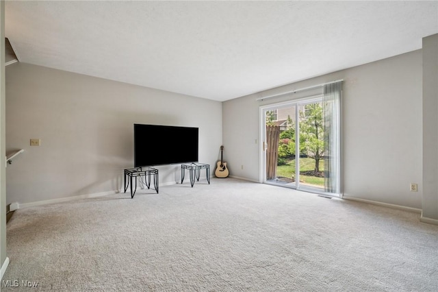 1653 Maple View Ct, Streetsboro, OH 44241 - unfurnished living room featuring carpet flooring and vaulted ceiling