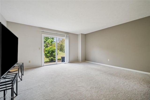 1653 Maple View Ct, Streetsboro, OH 44241 - unfurnished living room with light carpet and baseboards