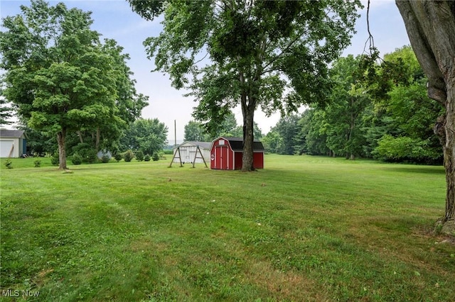 34 Prospect St, Seville, OH 44273 - view of green lawn featuring a storage unit