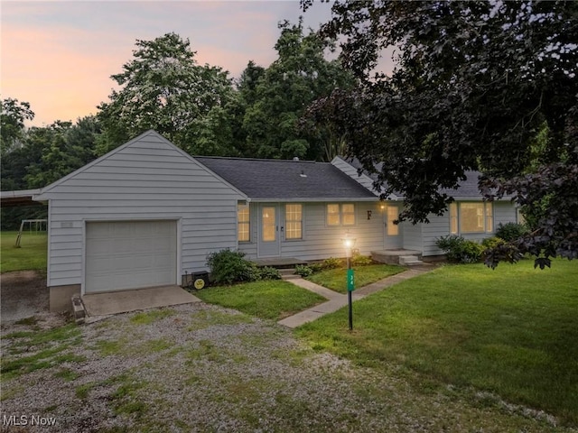 34 Prospect St, Seville, OH 44273 - ranch-style house featuring a front yard, a garage, and driveway
