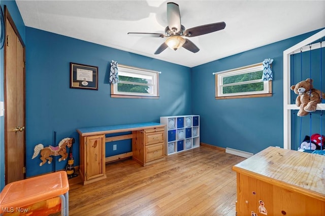 34 Prospect St, Seville, OH 44273 - office with baseboard heating, light wood-style floors, plenty of natural light, and ceiling fan