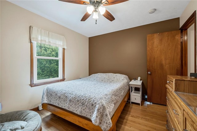 34 Prospect St, Seville, OH 44273 - bedroom with light wood finished floors and a ceiling fan