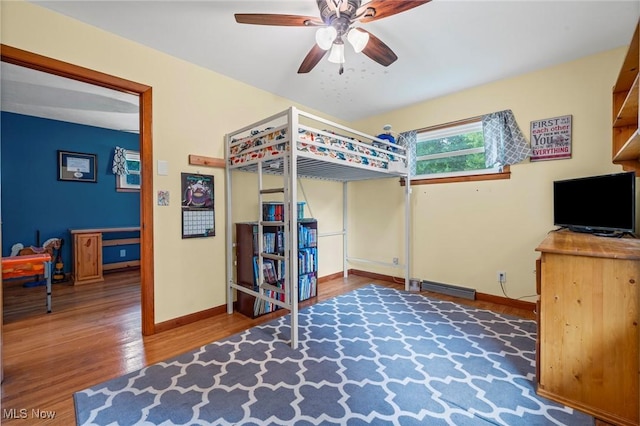 34 Prospect St, Seville, OH 44273 - bedroom with wood finished floors and a ceiling fan