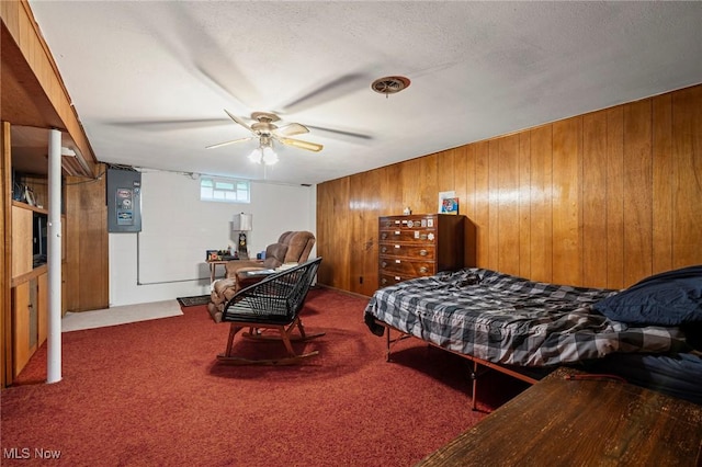 34 Prospect St, Seville, OH 44273 - bedroom with wood walls, carpet, and ceiling fan