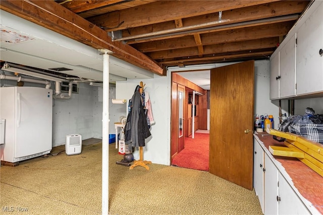 34 Prospect St, Seville, OH 44273 - finished basement featuring freestanding refrigerator