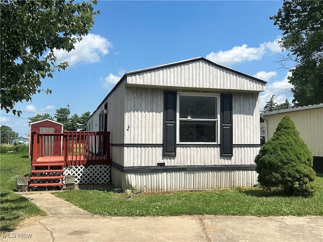 152 N Main St Unit 2, New London, OH 44851 - view of side of property featuring a deck