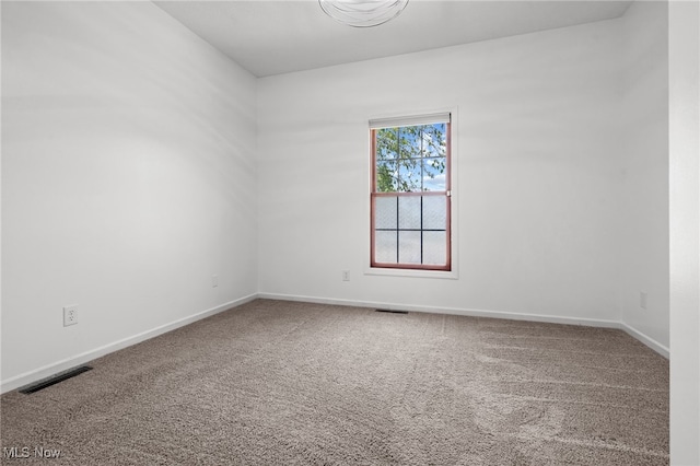 4428 Trail Head Cir NW, Massillon, OH 44647 - spare room with carpet floors and baseboards