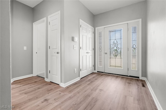 4428 Trail Head Cir NW, Massillon, OH 44647 - foyer entrance featuring wood finished floors