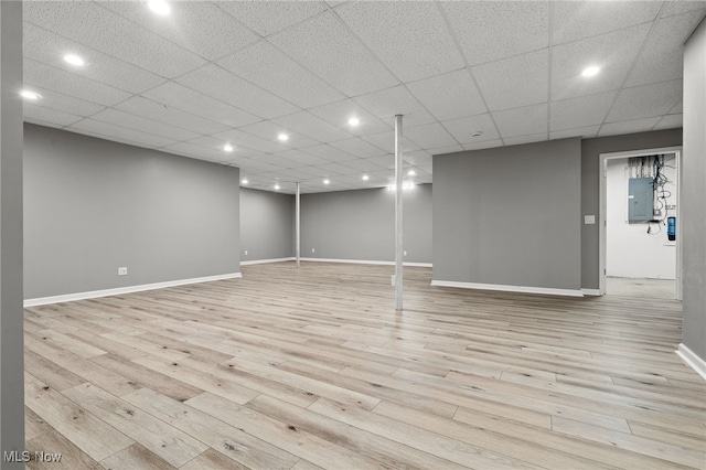 4428 Trail Head Cir NW, Massillon, OH 44647 - finished basement with light wood-type flooring, electric panel, and recessed lighting