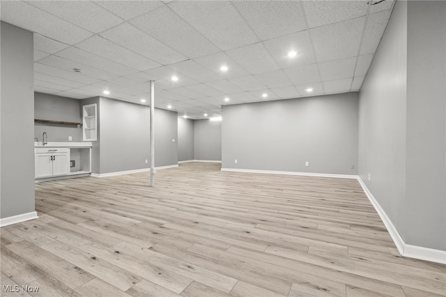 4428 Trail Head Cir NW, Massillon, OH 44647 - finished basement featuring light wood-style floors and recessed lighting