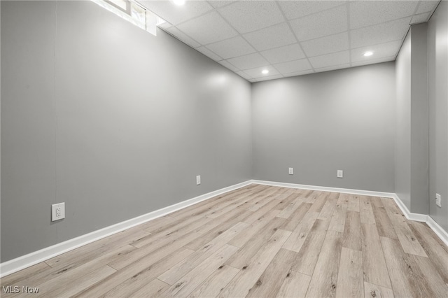 4428 Trail Head Cir NW, Massillon, OH 44647 - spare room featuring light wood-style floors, a drop ceiling, and recessed lighting