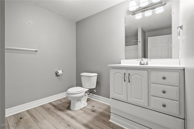 4428 Trail Head Cir NW, Massillon, OH 44647 - bathroom with vanity and wood finished floors