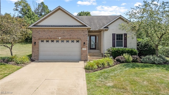 4428 Trail Head Cir NW, Massillon, OH 44647 - ranch-style home featuring brick siding, driveway, an attached garage, and a front lawn