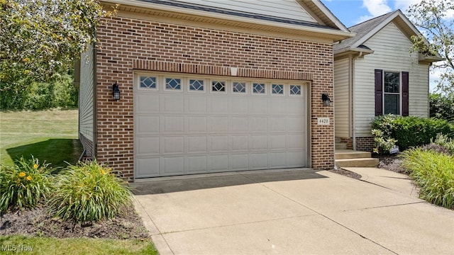 4428 Trail Head Cir NW, Massillon, OH 44647 - garage with driveway