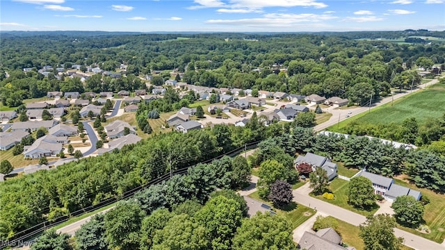 4428 Trail Head Cir NW, Massillon, OH 44647 - aerial view of residential area featuring a forest