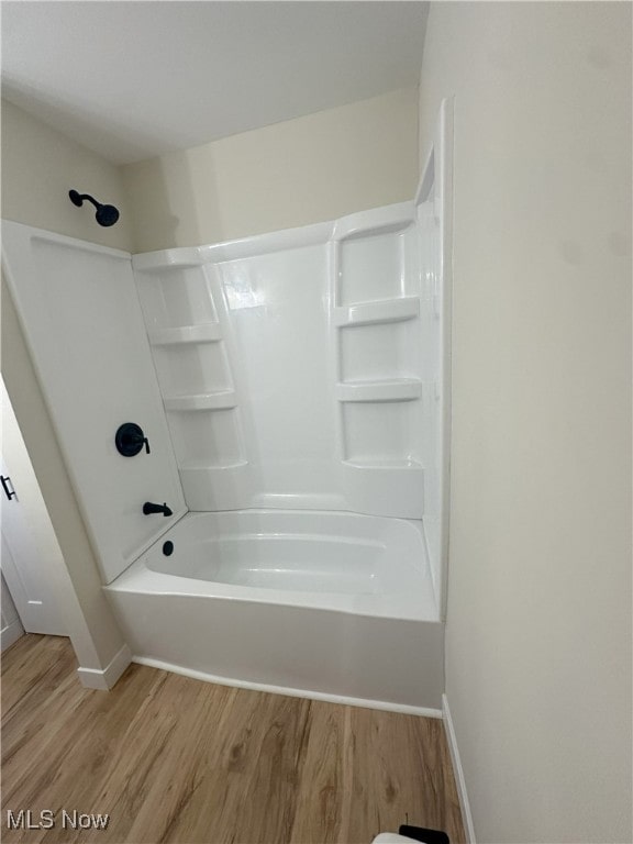 9822 Hooper Rd, Athens, OH 45701 - full bath with wood finished floors and washtub / shower combination