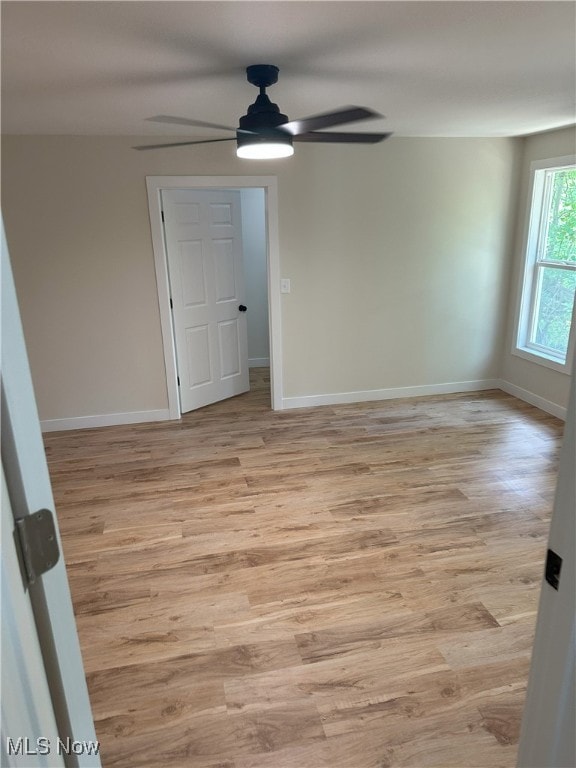 9822 Hooper Rd, Athens, OH 45701 - unfurnished room featuring a ceiling fan and light wood-type flooring