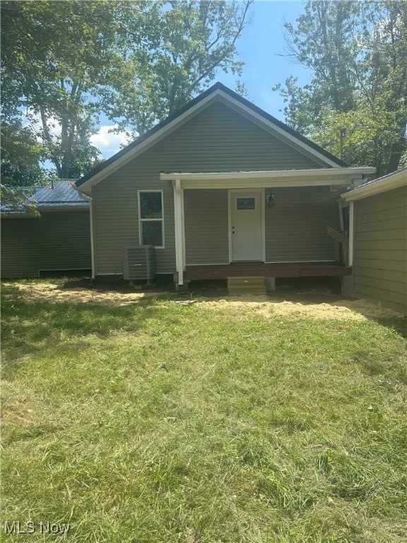 9822 Hooper Rd, Athens, OH 45701 - rear view of house with a yard