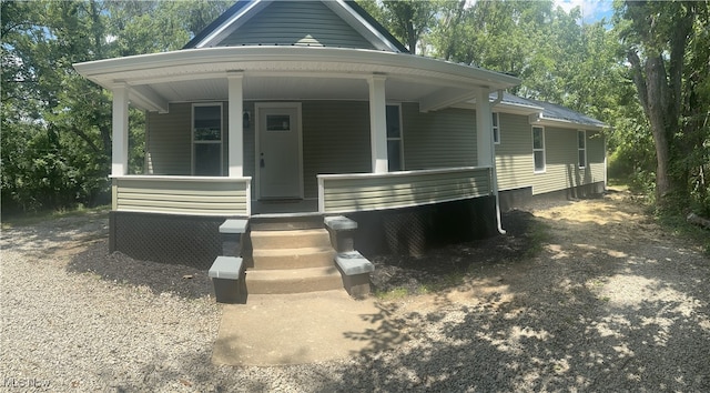 9822 Hooper Rd, Athens, OH 45701 - view of front of house featuring a porch and view of scattered trees