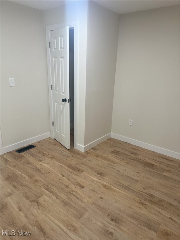 9822 Hooper Rd, Athens, OH 45701 - empty room with light wood-type flooring and baseboards