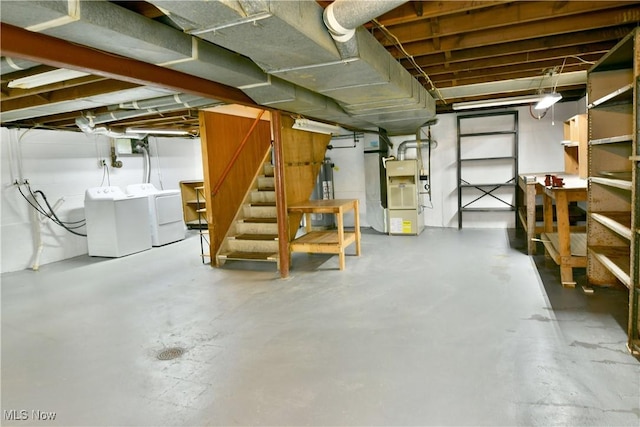 131 Euclid Blvd, Youngstown, OH 44505 - unfinished below grade area featuring heating unit, water heater, stairway, and independent washer and dryer