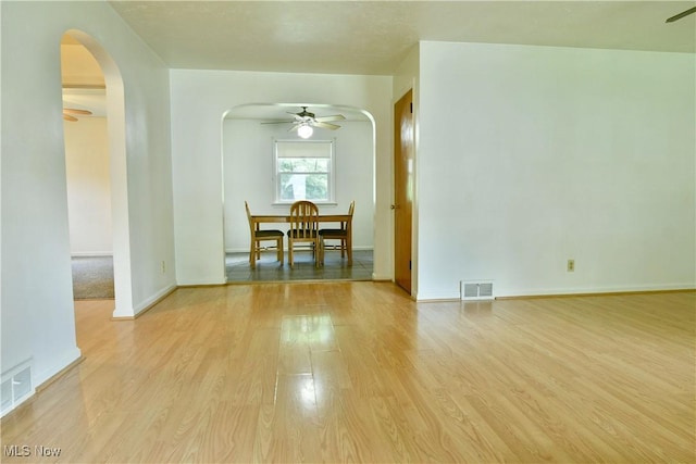131 Euclid Blvd, Youngstown, OH 44505 - unfurnished room featuring a ceiling fan, arched walkways, and light wood-style flooring