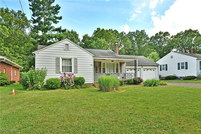 131 Euclid Blvd, Youngstown, OH 44505 - single story home with a front lawn, driveway, an attached garage, and covered porch