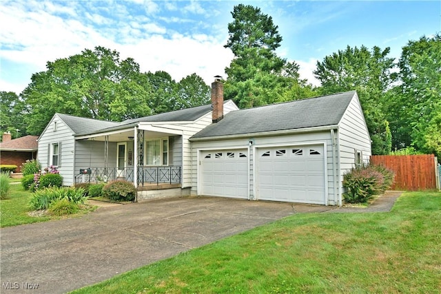131 Euclid Blvd, Youngstown, OH 44505 - single story home featuring a porch, a garage, a chimney, and driveway