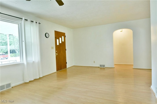 131 Euclid Blvd, Youngstown, OH 44505 - unfurnished room with light wood-type flooring, ceiling fan, and arched walkways