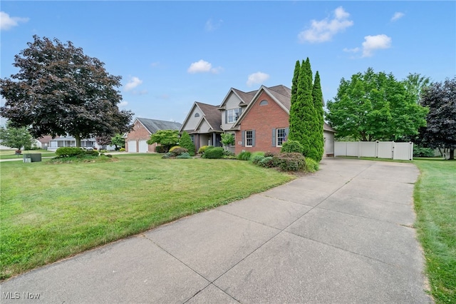 1133 S Azalea Blvd, Barberton, OH 44203 - view of front of house featuring driveway and a garage