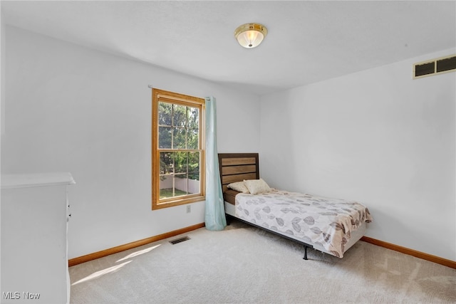 1133 S Azalea Blvd, Barberton, OH 44203 - carpeted bedroom featuring baseboards