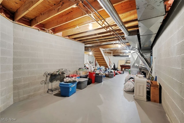 1133 S Azalea Blvd, Barberton, OH 44203 - unfinished below grade area featuring stairway and concrete block wall