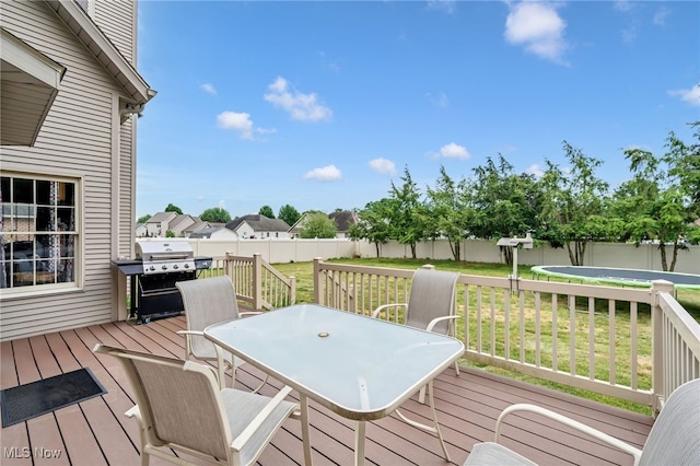 1133 S Azalea Blvd, Barberton, OH 44203 - wooden terrace with area for grilling and outdoor dining space