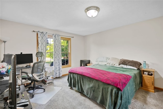 1133 S Azalea Blvd, Barberton, OH 44203 - carpeted bedroom featuring a desk and baseboards