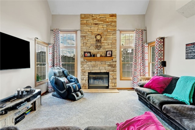 1133 S Azalea Blvd, Barberton, OH 44203 - carpeted living area featuring a stone fireplace