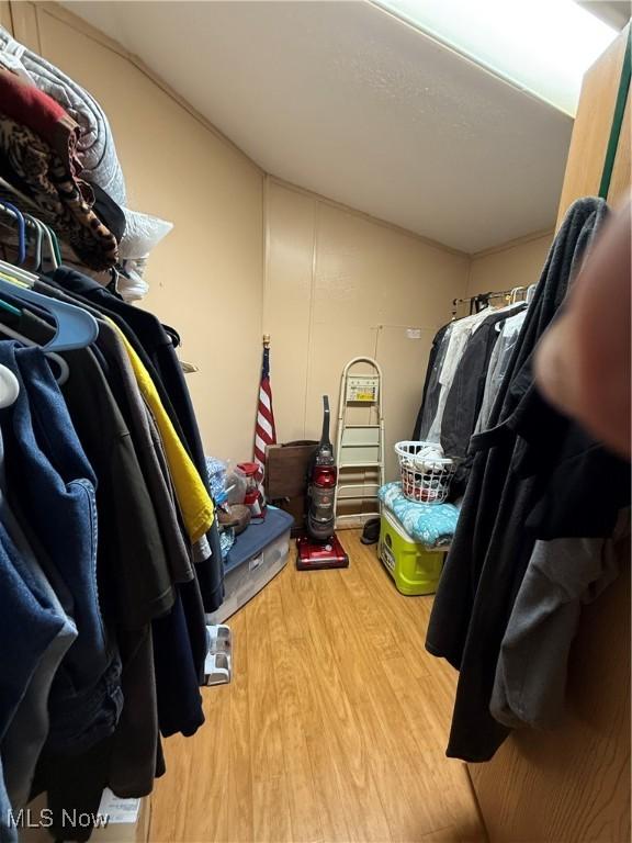 3925 N Ridge E, Ashtabula, OH 44004 - spacious closet featuring wood finished floors and vaulted ceiling