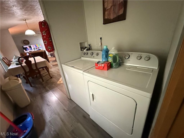 3925 N Ridge E, Ashtabula, OH 44004 - washroom with separate washer and dryer and wood finished floors