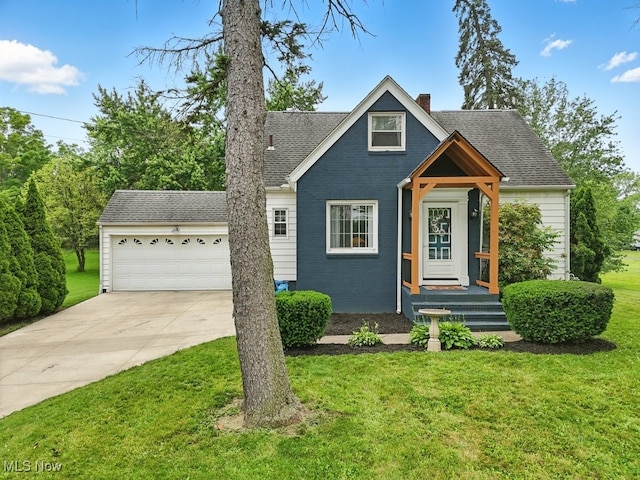 1624 Krumroy Rd, Akron, OH 44306 - view of front of home featuring a chimney, concrete driveway, a front lawn, and roof with shingles