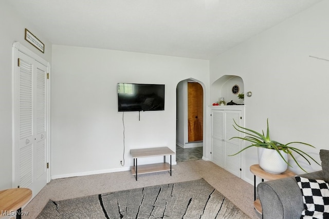 1624 Krumroy Rd, Akron, OH 44306 - living room with arched walkways and carpet