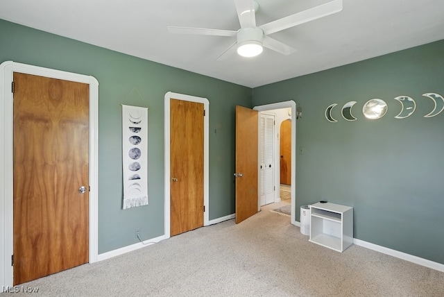 1624 Krumroy Rd, Akron, OH 44306 - unfurnished bedroom featuring carpet floors and a ceiling fan
