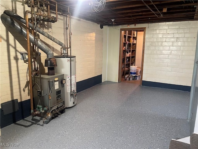 1624 Krumroy Rd, Akron, OH 44306 - unfinished below grade area featuring gas water heater, concrete block wall, and a heating unit