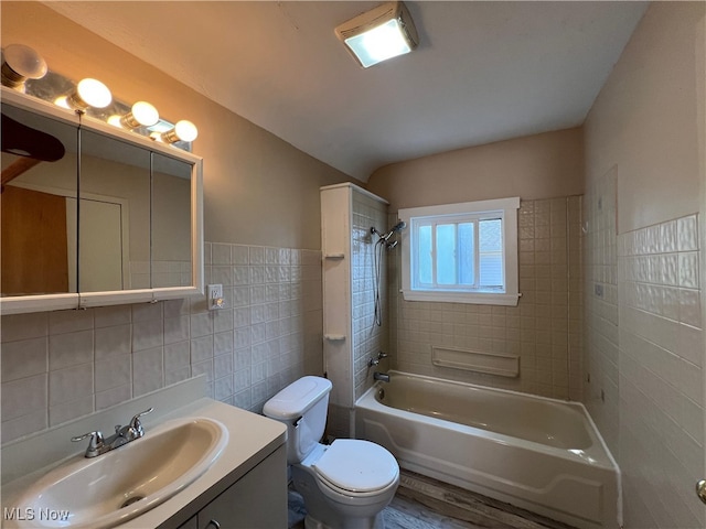 1365 Craneing Rd, Wickliffe, OH 44092 - full bathroom with tile walls, vanity, and shower / bath combination