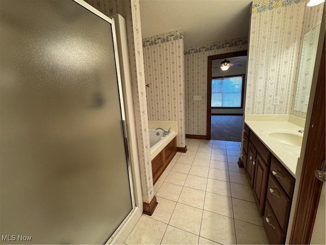 1204 Saint Abigail St SW, Hartville, OH 44632 - full bathroom featuring wallpapered walls, a shower stall, tile patterned floors, vanity, and a textured ceiling