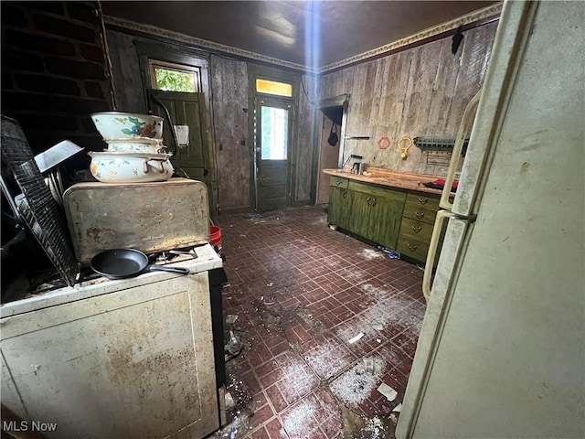 1529 Stark Ave SW, Canton, OH 44706 - kitchen featuring freestanding refrigerator, brick patterned floors, and green cabinetry