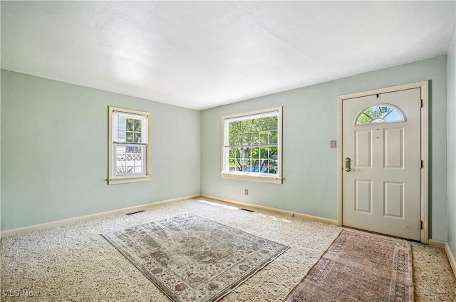 474 W 4th St, Salem, OH 44460 - entryway featuring baseboards and carpet floors